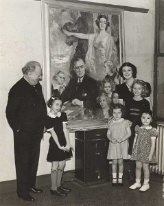 30:3  Howard Chandler Christy stands before his 1938 painting to celebrate FDR's birthday with models including Elise Ford, right, and granddaughter, Carolyn Chandler, left.