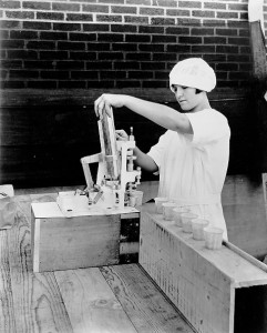 Demonstration of Dixie Hand Capper, ca. 1920s