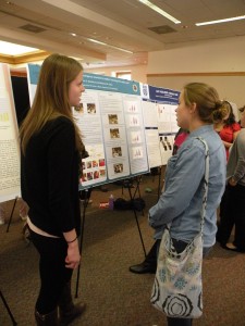 Future lab member Emily Crawford ('15) talks with Lauren Steinbeck ('14).