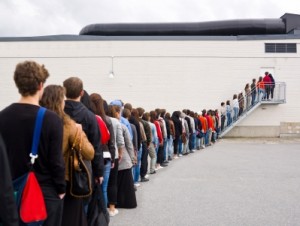 Large group of people waiting in line