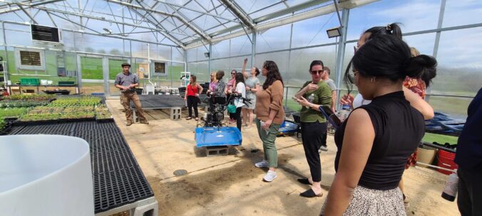 Lafayette staff learn about the LaFarm greenhouse