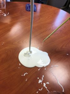 Bleck - Oobleck's shear strength and viscosity increase when the fluid is agitated. It also makes a large mess when poured on a table. - submitted by  Louis Papsdorf
