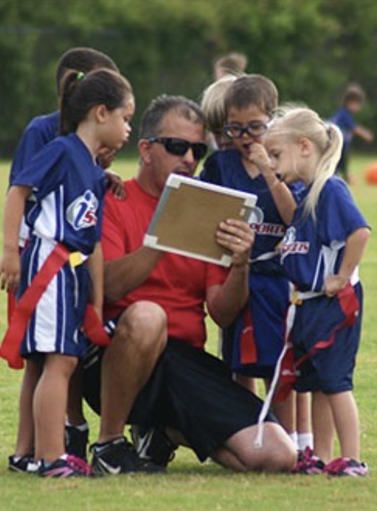 Youth coach working with children