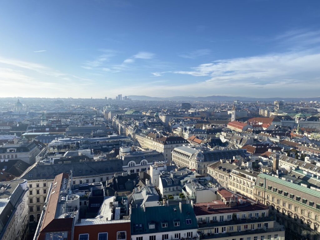 Overhead view of Vienna. Baroque Buildings are in the foreground, with modern buildings in the far background