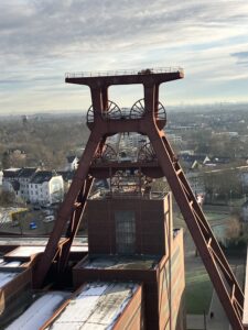 wheels of a mine elevator on a tower