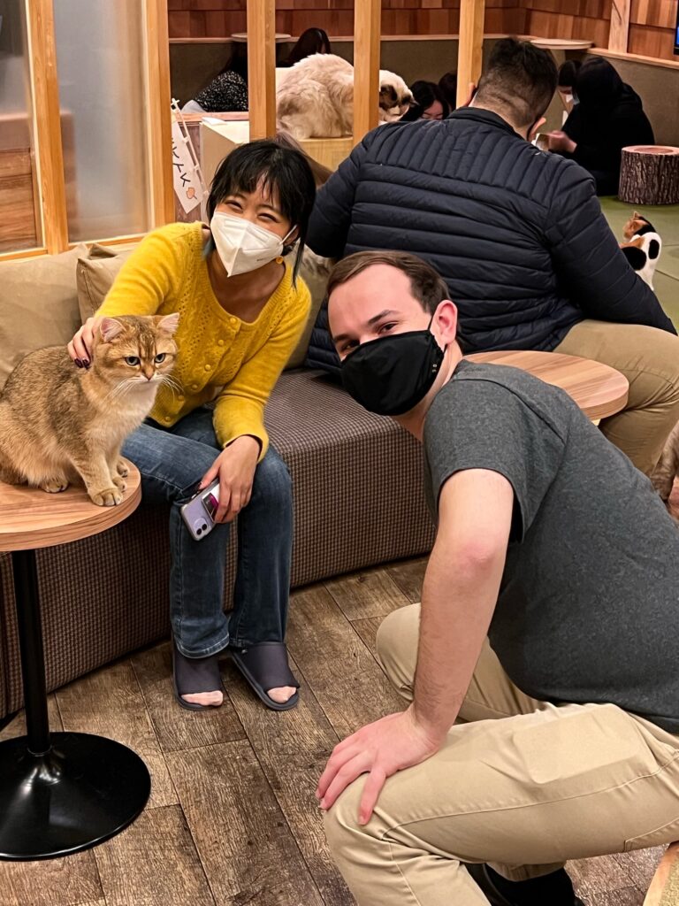 Shirley and Ben at a cat cafe in Tokyo