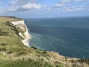 Chalk cliff in profile with view of the English Channel below